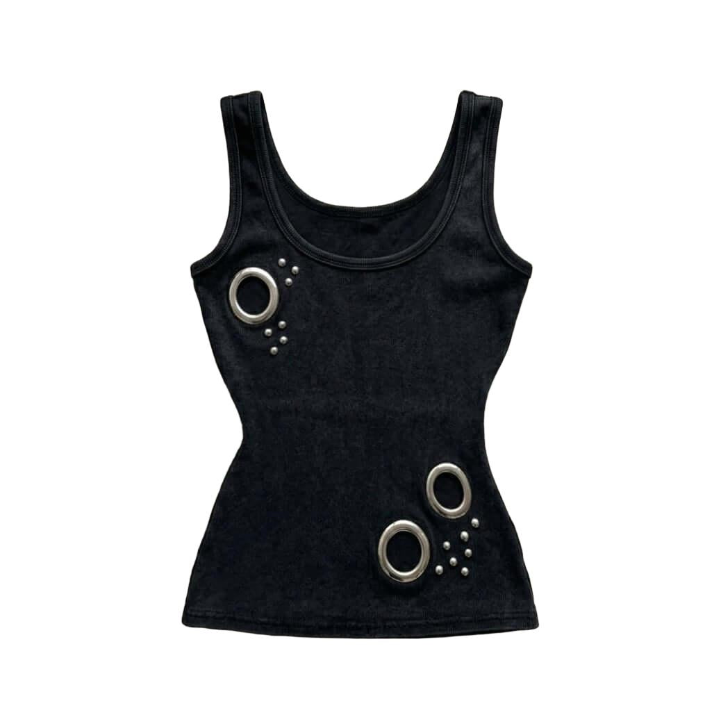Studded Tank Top O-ring Elevate your urban wardrobe with the Cyber O-Ring Studded Tank Top, a high-impact piece that merges industrial hardware with a sleek, futuristic silhouette. This tank top is a standout essential for any cyber-alt or techwear-inspir