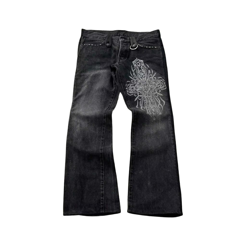 Gothic Cross Black Flared Jeans - Cyber Grunge Gothic Cross Black Flared Jeans - Cyber Grunge These black flared jeans feature a bold Gothic-Grunge aesthetic. The standout feature is the oversized gothic cross with tribal scrollwork printed on the left th