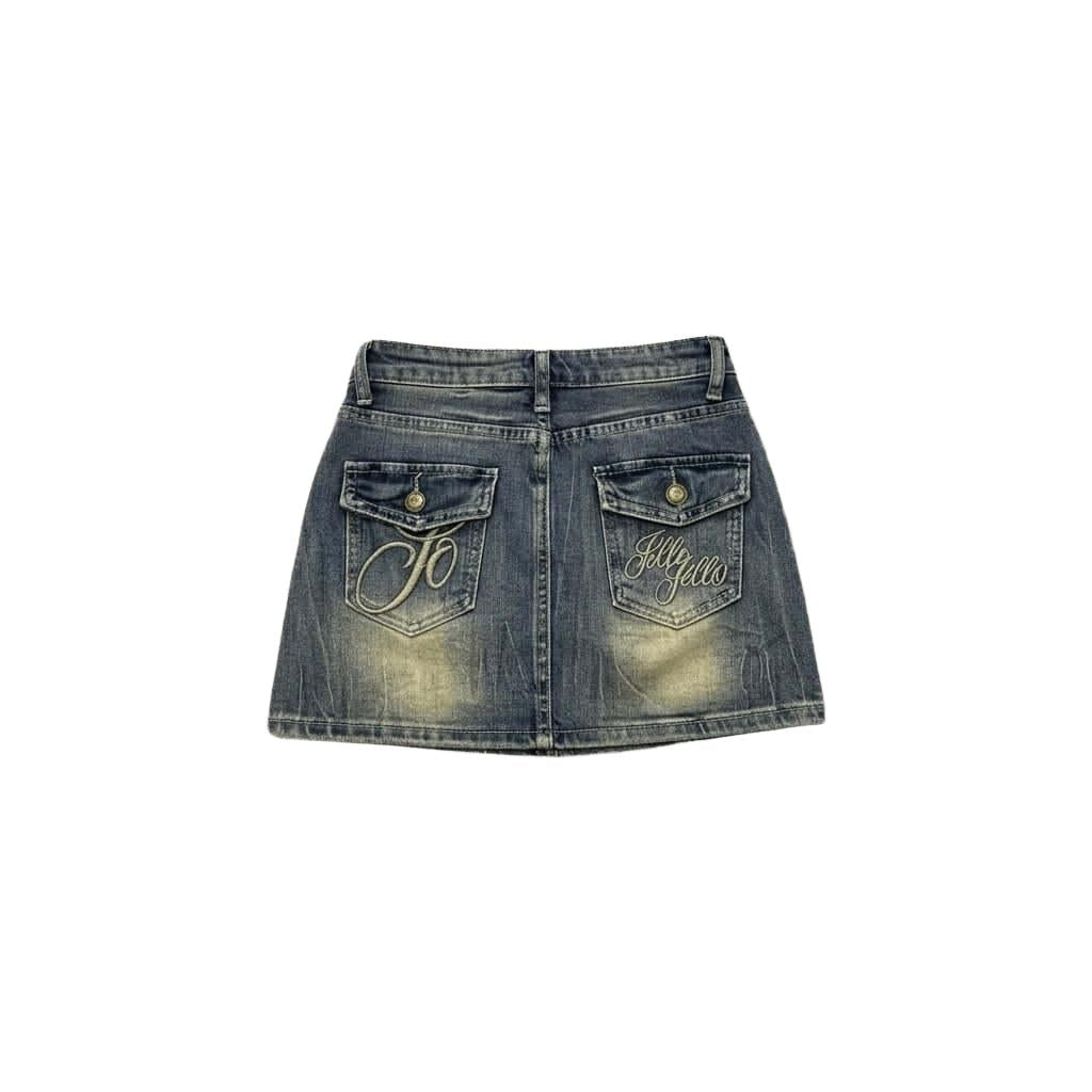 Jello Denim Mini Skirt Embroidered Pocket Detail & Sand Wash Shop the Jello Denim Mini Skirt Embroidered Pocket Detail & Sand Wash for a vintage look with intricate embroidery and classic A-line style.