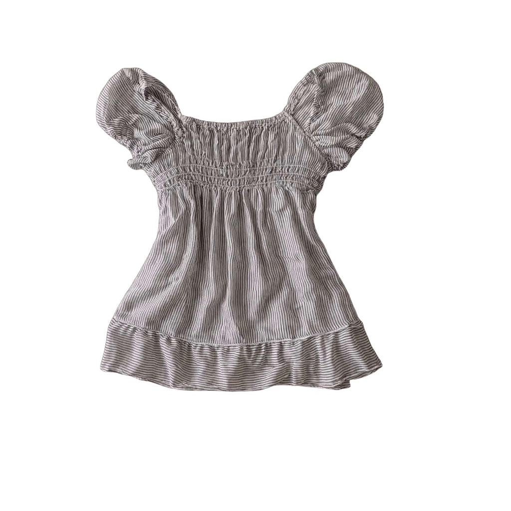 Grey Pinstripe Peplum Top with Front Bow Grey Pinstripe Peplum Top with Front Bow This grey pinstripe peplum top features a square neckline, an elasticated smocked bodice, and a statement adjustable self-tie bow detail on the front. Designed with short pu