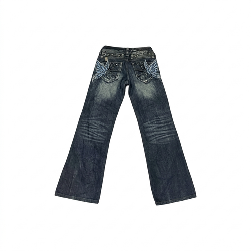 Back view of butterfly embroidery flare jeans featuring blue butterfly designs on pockets and a distressed finish.