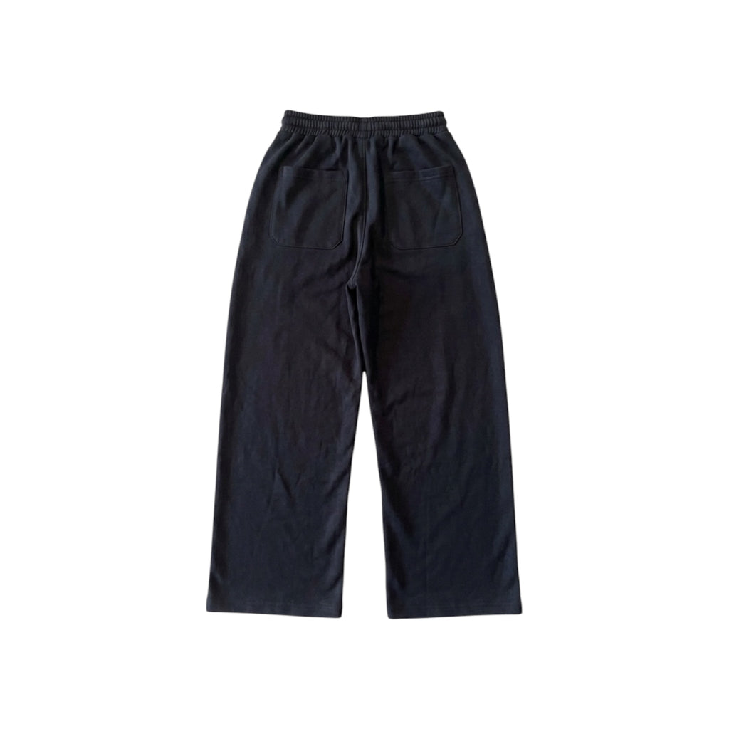 Union Jack straight pants with asymmetrical print and workwear style