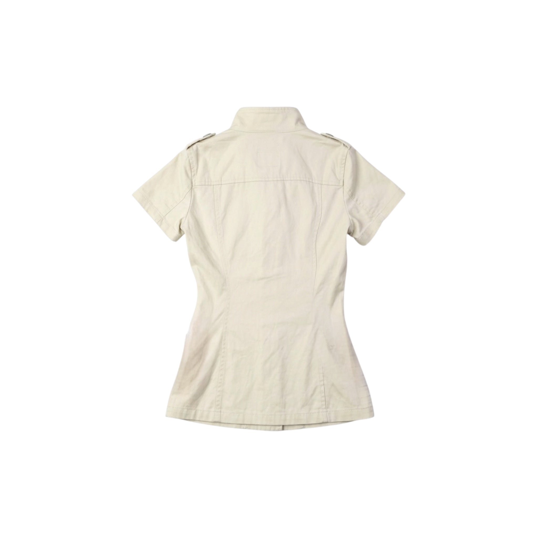 Back view of cream button-front short sleeve jacket showcasing its structured silhouette and high-neck collar.