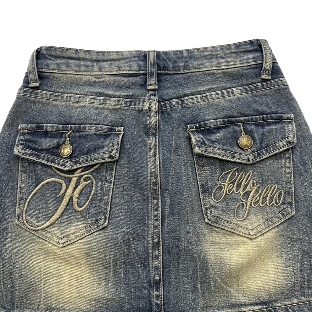 Jello denim mini skirt with embroidered back pockets and faded sand wash