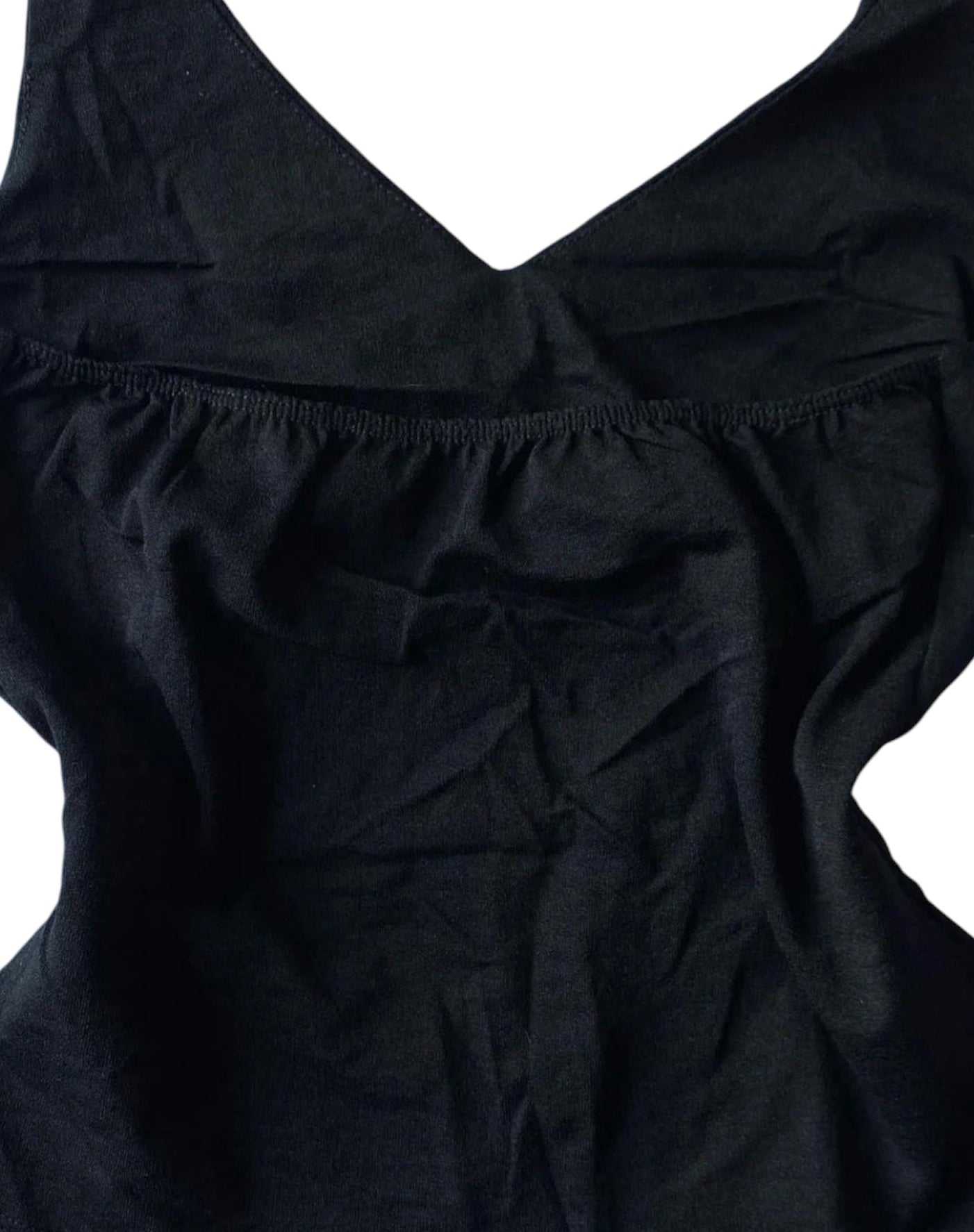 Black Y2K graphic halterneck top with distressed daisy print and deep V-neckline