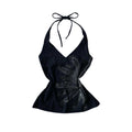 Black Y2K graphic halterneck top with distressed daisy print and deep V-neckline