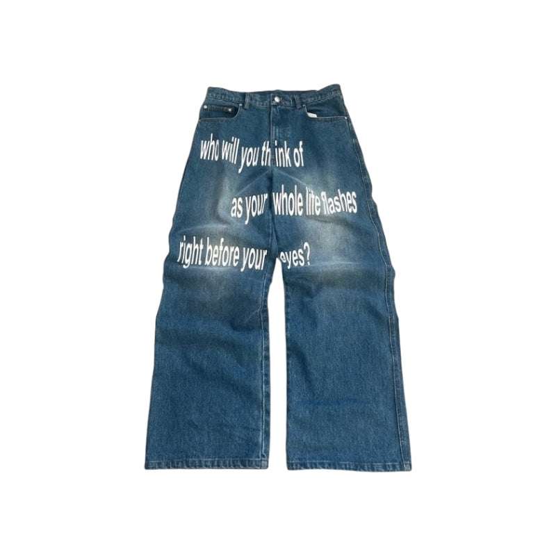 Y2K graphic wide-leg denim jeans with existential text and vintage faded wash