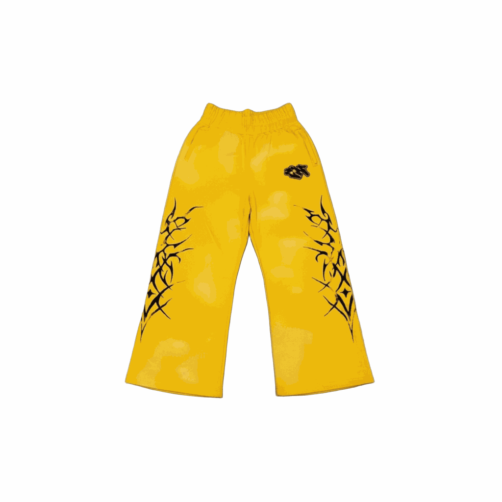 Yellow cyber-tribal wide leg sweatpants with geometric tribal print and elastic mid-rise waist